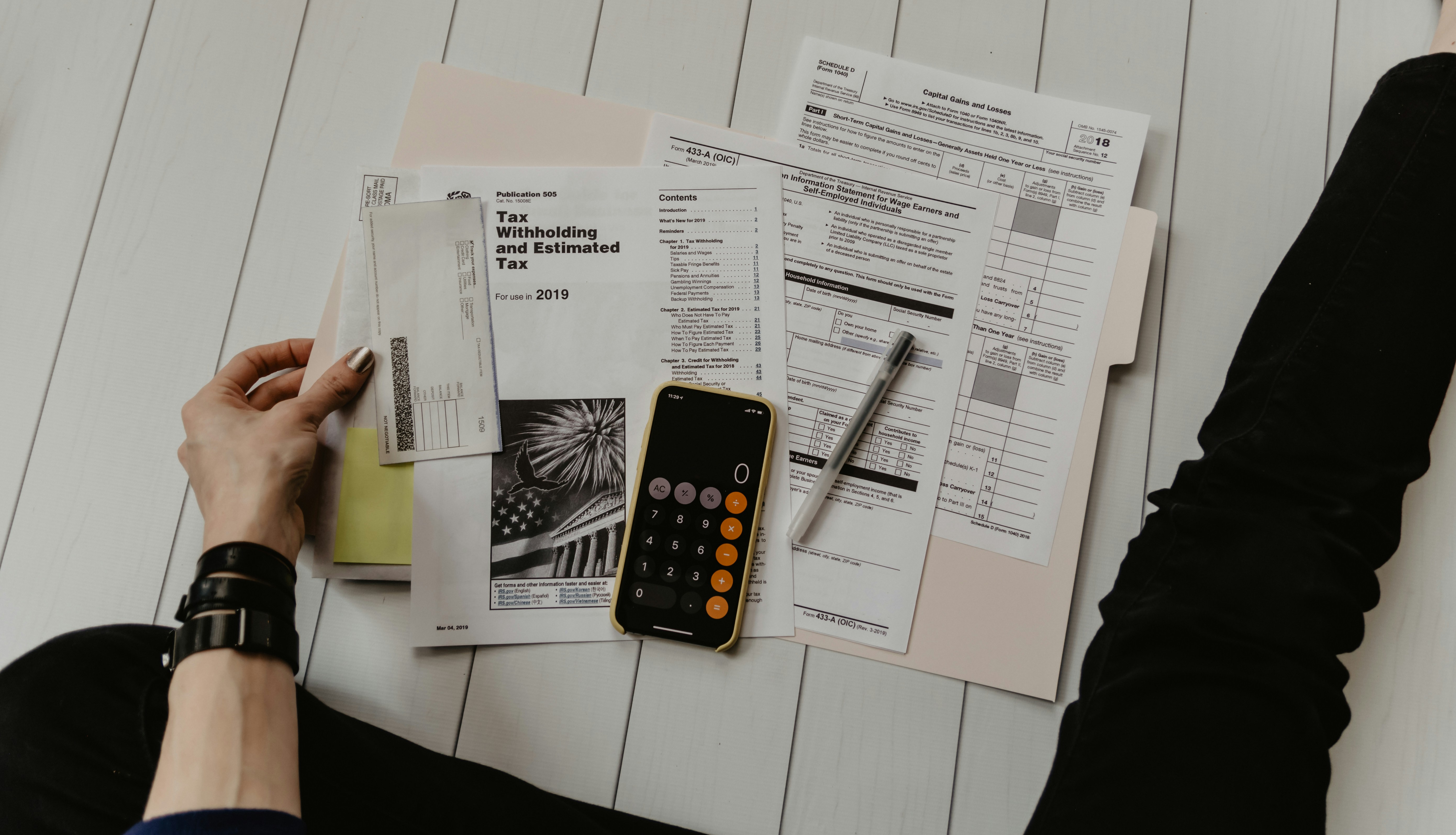 A professional reviewing financial documents