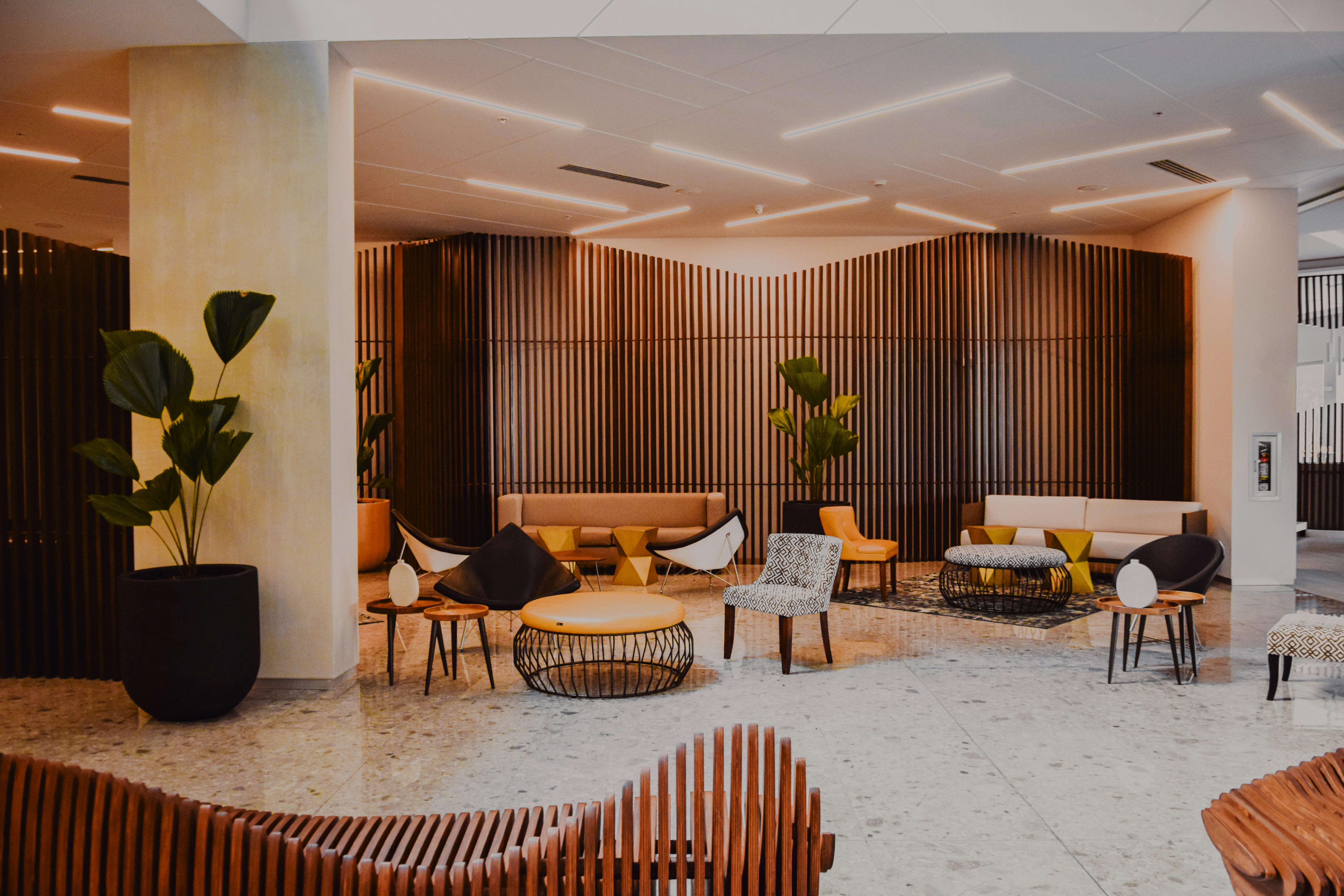 A luxury hotel lobby with warm ambient lighting