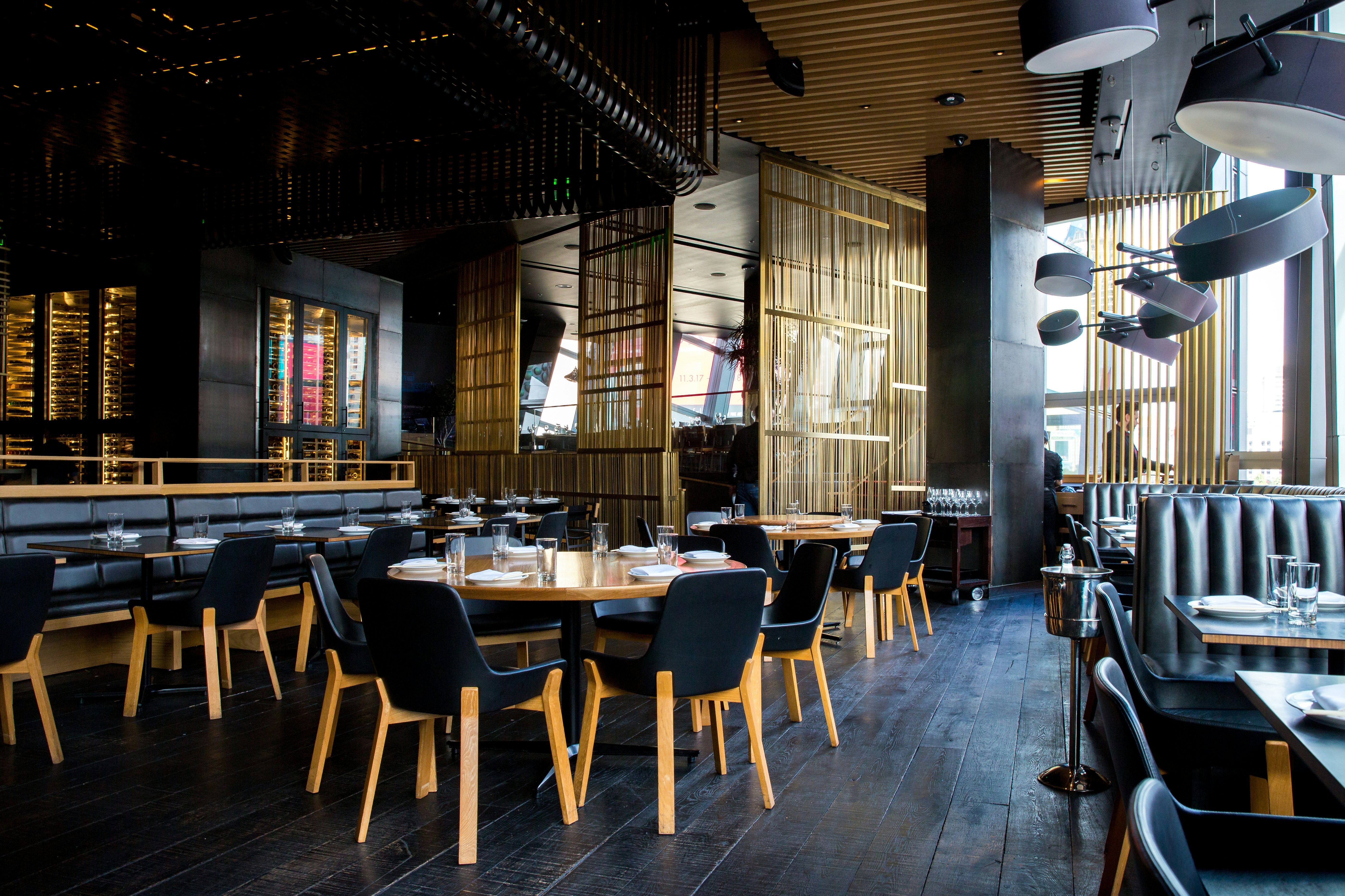 A restaurant interior with warm ambient lighting